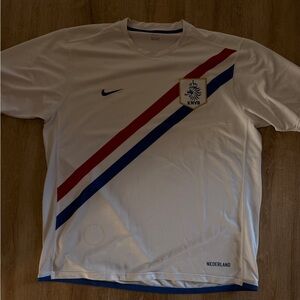 White Nike Soccer Jersey with Red and Blue Stripes. Netherlands